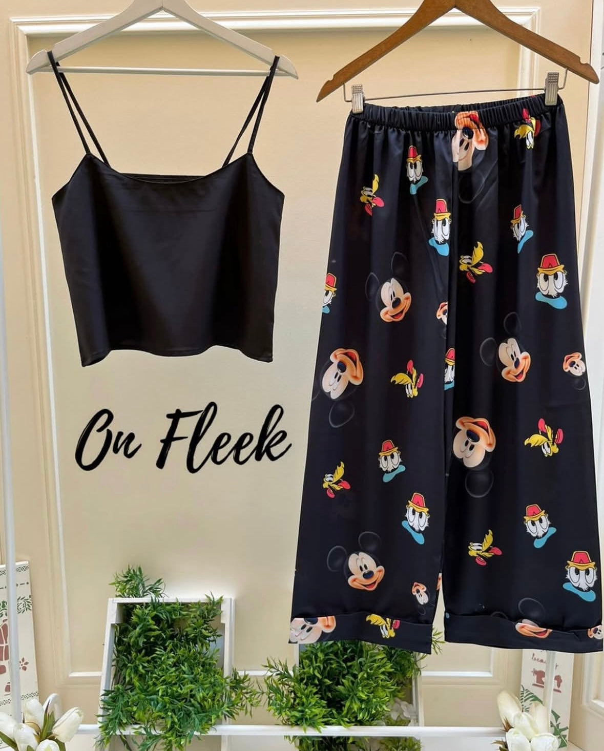 Black Disney pants with cut black top