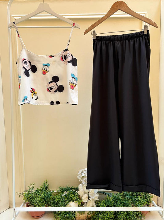 White disney cut top with black soft pants